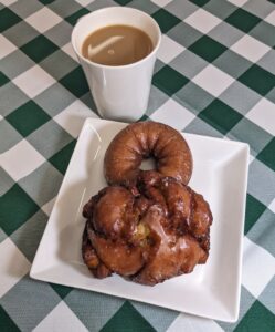 Coffee and two donuts 